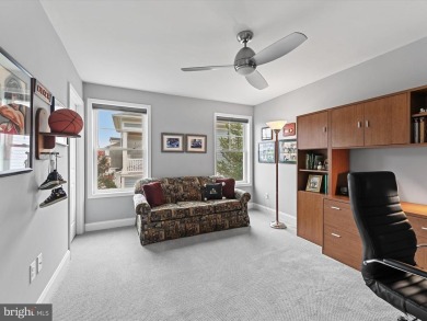 The welcoming covered entry of 33437 Islander Drive invites you on The Peninsula Golf and Country Club in Delaware - for sale on GolfHomes.com, golf home, golf lot