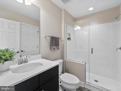 The welcoming covered entry of 33437 Islander Drive invites you on The Peninsula Golf and Country Club in Delaware - for sale on GolfHomes.com, golf home, golf lot