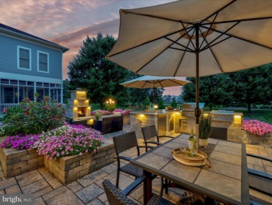 The welcoming covered entry of 33437 Islander Drive invites you on The Peninsula Golf and Country Club in Delaware - for sale on GolfHomes.com, golf home, golf lot