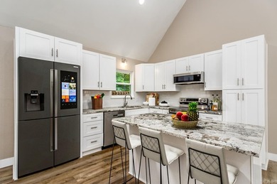 Lakefront Retreat in Diamondhead - Dock Potential & Golf Access on Diamondhead Golf and Country Club in Arkansas - for sale on GolfHomes.com, golf home, golf lot