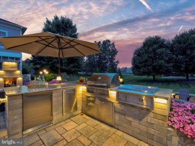 The welcoming covered entry of 33437 Islander Drive invites you on The Peninsula Golf and Country Club in Delaware - for sale on GolfHomes.com, golf home, golf lot