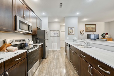 Experience relaxed, worry-free living in this exceptional patio on Payne Stewart Golf Club of Branson Hills - Front in Missouri - for sale on GolfHomes.com, golf home, golf lot