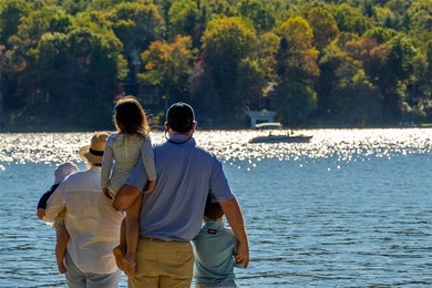 Welcome to an extraordinary lakefront estate on Lake Toxaway on Lake Toxaway Country Club in North Carolina - for sale on GolfHomes.com, golf home, golf lot