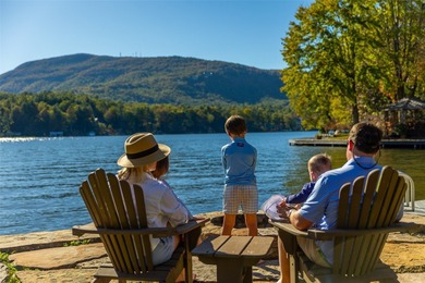 Welcome to an extraordinary lakefront estate on Lake Toxaway on Lake Toxaway Country Club in North Carolina - for sale on GolfHomes.com, golf home, golf lot