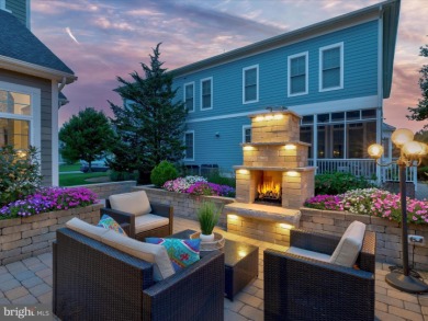 The welcoming covered entry of 33437 Islander Drive invites you on The Peninsula Golf and Country Club in Delaware - for sale on GolfHomes.com, golf home, golf lot