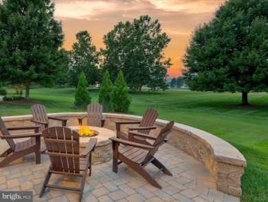 The welcoming covered entry of 33437 Islander Drive invites you on The Peninsula Golf and Country Club in Delaware - for sale on GolfHomes.com, golf home, golf lot