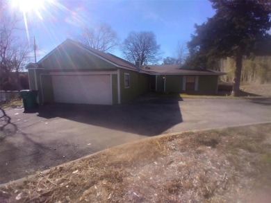 Beautifully unique 4 bedroom 2 bath home with ponds on the on Lake Whitney Country Club in Texas - for sale on GolfHomes.com, golf home, golf lot