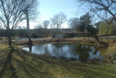 Beautifully unique 4 bedroom 2 bath home with ponds on the on Lake Whitney Country Club in Texas - for sale on GolfHomes.com, golf home, golf lot