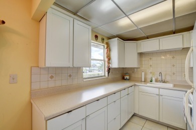 Welcome home to this move in ready 2nd floor corner in the on Kings Point Golf - Executive in Florida - for sale on GolfHomes.com, golf home, golf lot