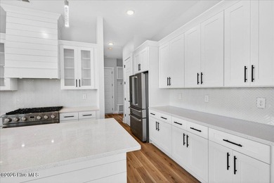 Another exceptional signature residence by Blue Turtle Holdings on Brunswick Plantation and Golf Resorts in North Carolina - for sale on GolfHomes.com, golf home, golf lot