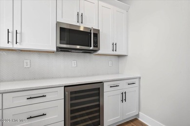 Another exceptional signature residence by Blue Turtle Holdings on Brunswick Plantation and Golf Resorts in North Carolina - for sale on GolfHomes.com, golf home, golf lot