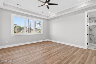 Another exceptional signature residence by Blue Turtle Holdings on Brunswick Plantation and Golf Resorts in North Carolina - for sale on GolfHomes.com, golf home, golf lot