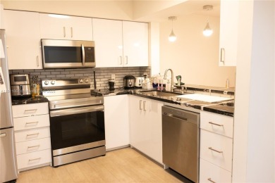 *Spacious and Bright 1-Bedroom, 2-Bath Condo in Cypress Bend on Palm-Aire Country Club and Resort - Palms in Florida - for sale on GolfHomes.com, golf home, golf lot