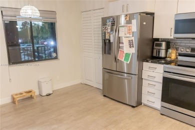*Spacious and Bright 1-Bedroom, 2-Bath Condo in Cypress Bend on Palm-Aire Country Club and Resort - Palms in Florida - for sale on GolfHomes.com, golf home, golf lot