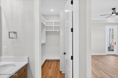 Another exceptional signature residence by Blue Turtle Holdings on Brunswick Plantation and Golf Resorts in North Carolina - for sale on GolfHomes.com, golf home, golf lot