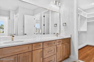 MOTIVATED SELLER! Another exceptional signature residence by on Brunswick Plantation and Golf Resorts in North Carolina - for sale on GolfHomes.com, golf home, golf lot