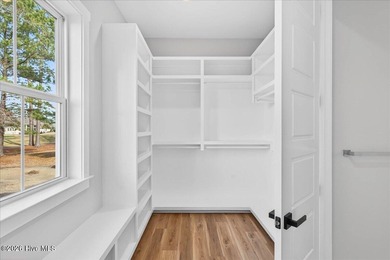 MOTIVATED SELLER! Another exceptional signature residence by on Brunswick Plantation and Golf Resorts in North Carolina - for sale on GolfHomes.com, golf home, golf lot