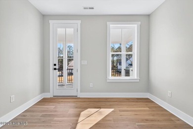 MOTIVATED SELLER! Another exceptional signature residence by on Brunswick Plantation and Golf Resorts in North Carolina - for sale on GolfHomes.com, golf home, golf lot