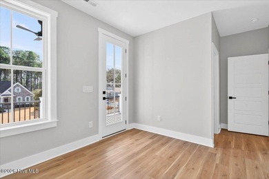 MOTIVATED SELLER! Another exceptional signature residence by on Brunswick Plantation and Golf Resorts in North Carolina - for sale on GolfHomes.com, golf home, golf lot