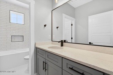 MOTIVATED SELLER! Another exceptional signature residence by on Brunswick Plantation and Golf Resorts in North Carolina - for sale on GolfHomes.com, golf home, golf lot