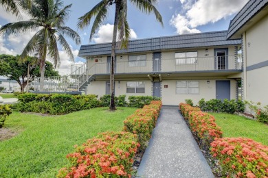 Welcome home to this move in ready 2nd floor corner in the on Kings Point Golf - Executive in Florida - for sale on GolfHomes.com, golf home, golf lot