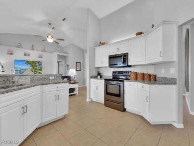Step into this beautifully maintained 3-bedroom, 2-bath on Coral Oaks Golf Course in Florida - for sale on GolfHomes.com, golf home, golf lot