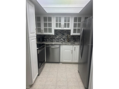 Welcome to this well-maintained 2-bedroom, 1.5-bath condo on Country Club At Silver Springs Shores in Florida - for sale on GolfHomes.com, golf home, golf lot