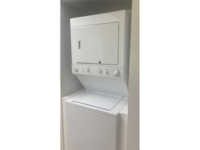 Welcome to this well-maintained 2-bedroom, 1.5-bath condo on Country Club At Silver Springs Shores in Florida - for sale on GolfHomes.com, golf home, golf lot
