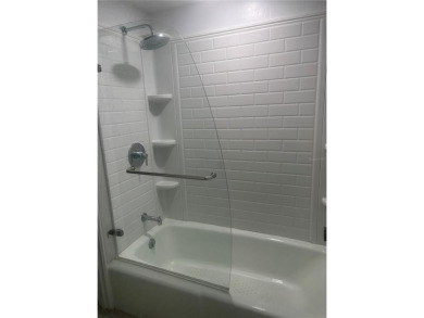 Welcome to this well-maintained 2-bedroom, 1.5-bath condo on Country Club At Silver Springs Shores in Florida - for sale on GolfHomes.com, golf home, golf lot