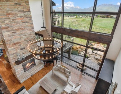 Nestled within the prestigious gated community of Red Ledges on Red Ledges Golf Club in Utah - for sale on GolfHomes.com, golf home, golf lot