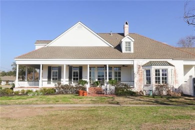 Welcome to this exquisite traditional home boasting luxurious on Lake Charles Country Club in Louisiana - for sale on GolfHomes.com, golf home, golf lot