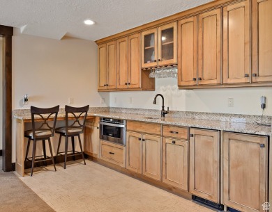 Nestled within the prestigious gated community of Red Ledges on Red Ledges Golf Club in Utah - for sale on GolfHomes.com, golf home, golf lot