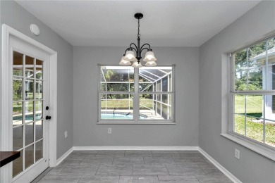 POOL HOME ON THE GOLF COURSE in the Laurel Oaks neighborhood of on Royal Oaks Golf Club in Florida - for sale on GolfHomes.com, golf home, golf lot