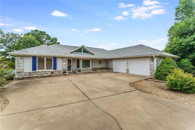 This is the home you won't want to leave! Beautiful curb appeal on Bella Vista Country Club - Scottsdale in Arkansas - for sale on GolfHomes.com, golf home, golf lot