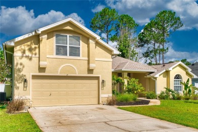 Welcome to this beautifully updated 5-bedroom, 3-bath pool home on The Grand Club - Pine Lakes Course in Florida - for sale on GolfHomes.com, golf home, golf lot