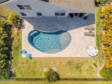 Welcome to 225 Perfect! This beautifully updated pool home is on LPGA International Golf Course in Florida - for sale on GolfHomes.com, golf home, golf lot