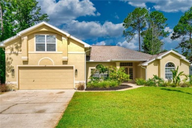 Welcome to this beautifully updated 5-bedroom, 3-bath pool home on The Grand Club - Pine Lakes Course in Florida - for sale on GolfHomes.com, golf home, golf lot