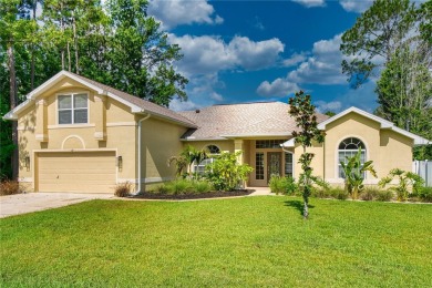 Welcome to this beautifully updated 5-bedroom, 3-bath pool home on The Grand Club - Pine Lakes Course in Florida - for sale on GolfHomes.com, golf home, golf lot