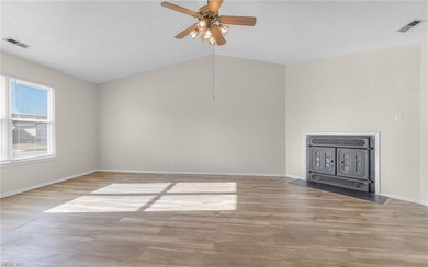 Located in the Rosemont Forest neighborhood of Virginia Beach on Stumpy Lake Golf Course in Virginia - for sale on GolfHomes.com, golf home, golf lot