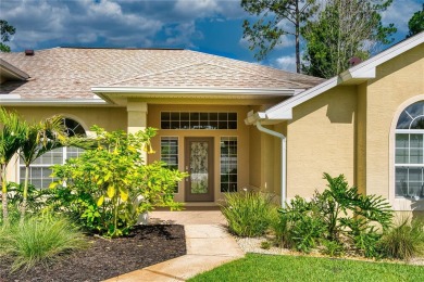Welcome to this beautifully updated 5-bedroom, 3-bath pool home on The Grand Club - Pine Lakes Course in Florida - for sale on GolfHomes.com, golf home, golf lot