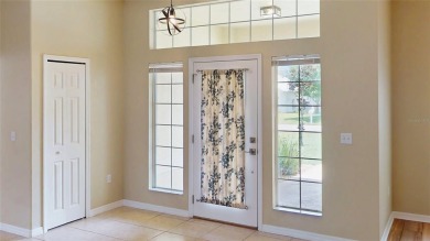 Welcome to this beautifully updated 5-bedroom, 3-bath pool home on The Grand Club - Pine Lakes Course in Florida - for sale on GolfHomes.com, golf home, golf lot