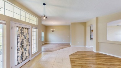 Welcome to this beautifully updated 5-bedroom, 3-bath pool home on The Grand Club - Pine Lakes Course in Florida - for sale on GolfHomes.com, golf home, golf lot