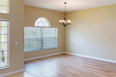 Welcome to this beautifully updated 5-bedroom, 3-bath pool home on The Grand Club - Pine Lakes Course in Florida - for sale on GolfHomes.com, golf home, golf lot
