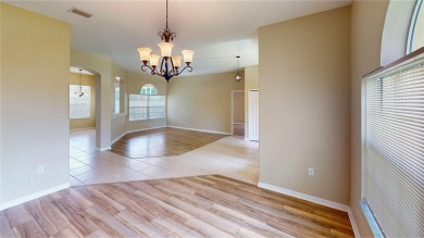Welcome to this beautifully updated 5-bedroom, 3-bath pool home on The Grand Club - Pine Lakes Course in Florida - for sale on GolfHomes.com, golf home, golf lot