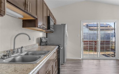 Located in the Rosemont Forest neighborhood of Virginia Beach on Stumpy Lake Golf Course in Virginia - for sale on GolfHomes.com, golf home, golf lot