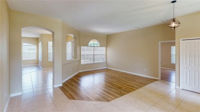 Welcome to this beautifully updated 5-bedroom, 3-bath pool home on The Grand Club - Pine Lakes Course in Florida - for sale on GolfHomes.com, golf home, golf lot