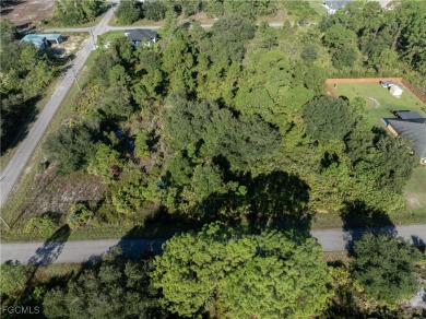 This 1/2 acre lot is located in a fast-growing side of Lehigh on Lehigh Resort Club in Florida - for sale on GolfHomes.com, golf home, golf lot