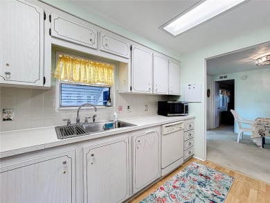 Location is everything and this home has it! Sit on one of the on Zellwood Station Country Club in Florida - for sale on GolfHomes.com, golf home, golf lot
