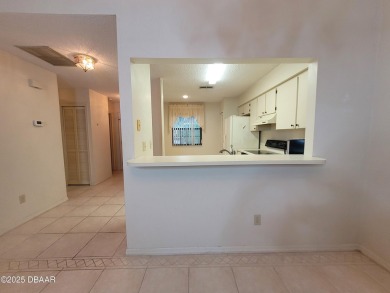 Located in the ST. ANDREWS section of Pelican Bay. Brick on The Club At Pelican Bay - North Course in Florida - for sale on GolfHomes.com, golf home, golf lot