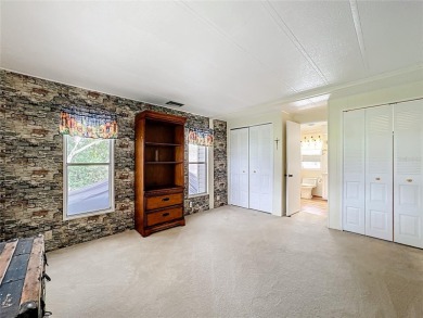 Location is everything and this home has it! Sit on one of the on Zellwood Station Country Club in Florida - for sale on GolfHomes.com, golf home, golf lot
